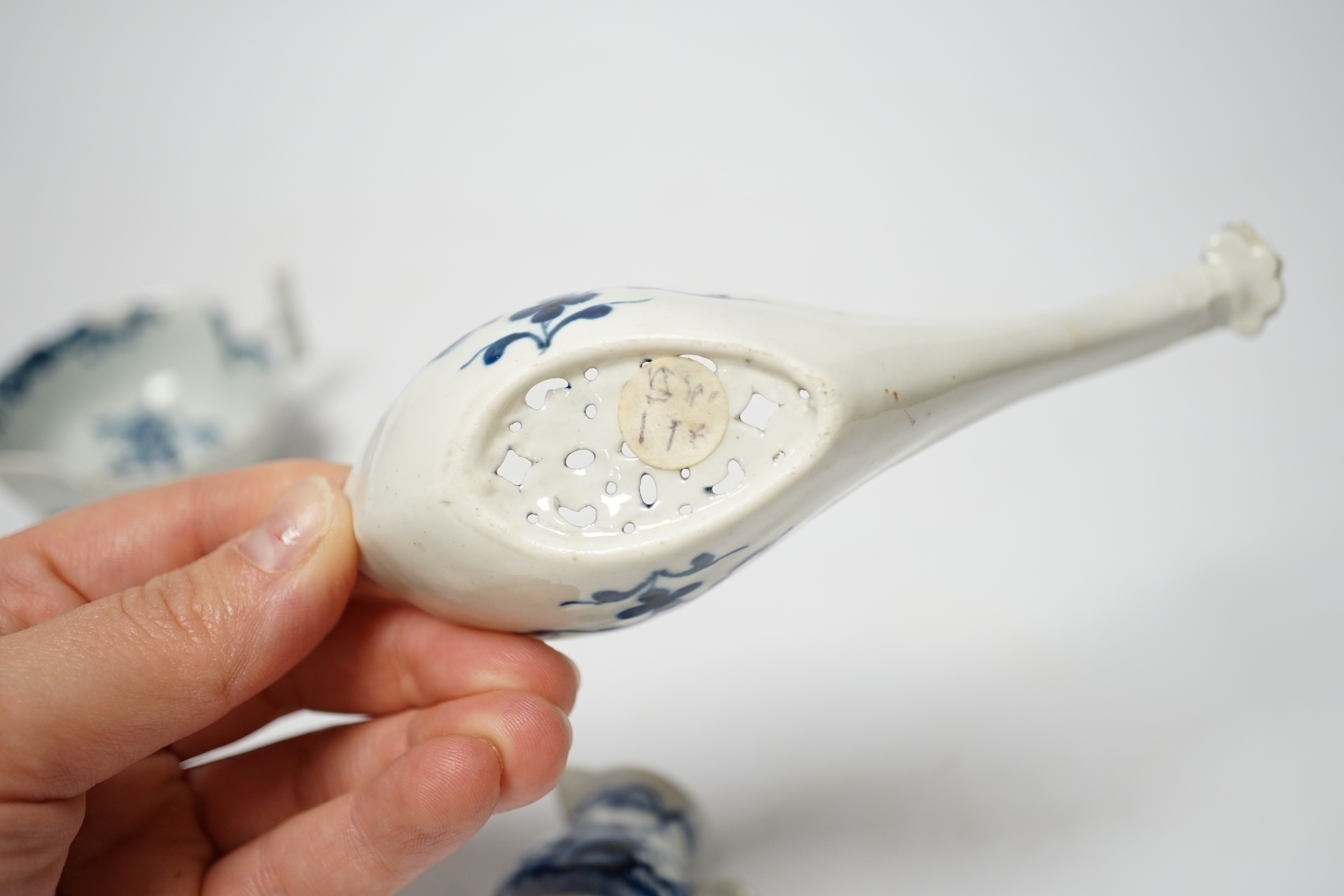 An 18th century Worcester spoon, a pickle dish and a miniature jug